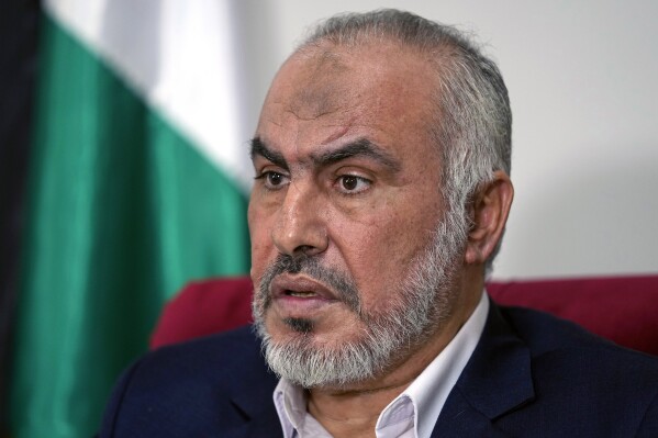 Ghazi Hamad, a member of Hamas' decision-making political bureau, speaks during an interview with The Associated Press in Beirut, Lebanon, Thursday, Oct. 26, 2023. Hamad said that the Palestinian militant group had expected stronger intervention from Hezbollah in its war with Israel, in a rare public appeal to its allies in the region. (AP Photo/Bilal Hussein)