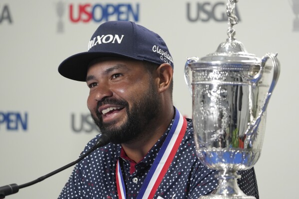 J.J. Spaun speaks during a news conference after winning the U.S. Open golf tournament at Oakmont Country Club Sunday, June 15, 2025, in Oakmont, Pa. (AP Photo/Gene J. Puskar)