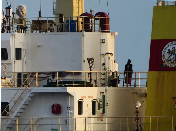 This photograph shared by Indian navy on the X platform shows people on board the hijacked ship ex-MV Ruen, Saturday, March 16, 2024. Indian navy says that it has intercepted the ship and has demanded that the pirates surrender and release all civilians held hostage on the ship. (Indian Navy on X via AP)