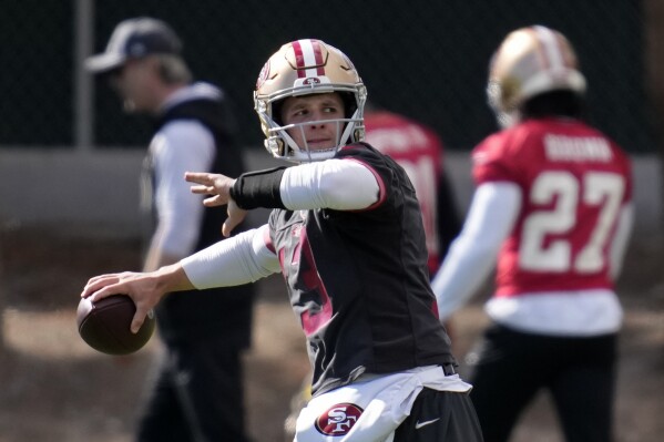 San Francisco 49ers quarterback Brock Purdy (13) throws during practice ahead of the Super Bowl 58 NFL football game Wednesday, Feb. 7, 2024, in Las Vegas. The 49ers play the Kansas City Chiefs Sunday in Las Vegas. (AP Photo/John Locher)