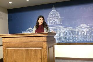 Erin Maye Quade, advocacy director for Gender Justice, speaks at a news conference at the State Capitol in St. Paul, Minnesota, on Thursday, March 3, 2022, against a bill that's part of the Senate Republican "Parents Bill of Rights." Maye Quade and other opponents say they fear the legislation could force teachers to out LGBTQ students to their parents, exclude transgender students from sports and remove consequences for bullying and harassment. (AP Photo/Steve Karnowski)