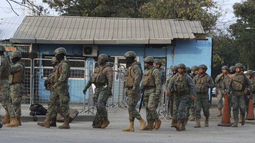 Soldiers leave the after taking control of the Litoral Penitentiary where a riot broke out that so far has left 5 prisoners dead, according to a statement from authorities, in Guayaquil, Ecuador, Sunday, July 23, 2023. (AP Photo/Cesar Munoz)
