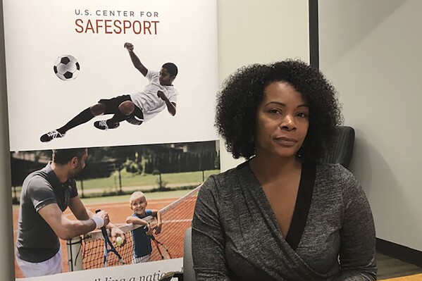 FILE - Ju'Riese Colon, the CEO for the U.S. Center for SafeSport, talks about the challenges facing her organization at their headquarters in Denver, Monday, Sept. 16, 2019. With just 60 full-time investigators, the Denver-based center has about 1,000 open cases and some 150 new complaints coming in every week. (AP Photo/Eddie Pells, File)