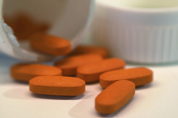 FILE - Tablets of ibuprofen are arranged for a photograph in New York on Thursday, Nov. 2, 2017. In 2023, more than 40% of American adults are considered obese, but the medications many take are rarely tested in bigger bodies. That’s because they are not required to be included in drug studies. Even a drug as common as ibuprofen, sold as Advil, may not relieve pain in people at higher weights when taken as directed, research shows. (AP Photo/Patrick Sison, File)