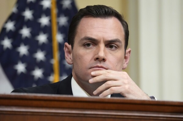 FILE - Chairman Rep. Mike Gallagher, R-Wis., listens during a hearing of a special House committee dedicated to countering China, on Capitol Hill, Feb. 28, 2023, in Washington. Members of Congress are raising alarms about what they see as America's failure to compete with China in biotechnology, with risks to U.S. national security and commercial interests. But as the countries' rivalry expands into the biotech industry, some say that shutting out Chinese companies would only hurt the U.S. (AP Photo/Alex Brandon, File)