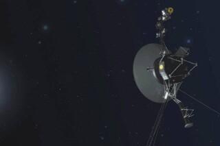 FILE - This illustration provided by NASA depicts Voyager 1. The most distant spacecraft from Earth stopped sending back understandable data in November 2023. The Jet Propulsion Laboratory in Southern California announced this week that Voyager 1's four scientific instruments are back in business after a technical snafu in November. (NASA via AP, File)
