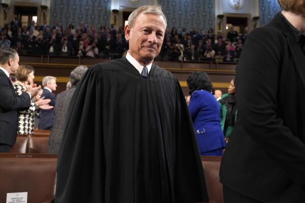 FILE - Chief Justice of the United States John Roberts arrives before President Joe Biden delivers the State of the Union address to a joint session of Congress at the Capitol, Feb. 7, 2023, in Washington. Roberts has declined a request from the Senate Judiciary Committee to testify at a hearing on ethical standards at the court, instead providing the panel with a statement of ethics reaffirmed by the court's justices. (AP Photo/Jacquelyn Martin, Pool)