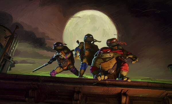 This image released by Paramount Pictures shows, from left, Donatello "Donnie", voiced by Micah Abbey, Leonardo "Leo", voiced by Nicolas Cantu, Raphael "Raph", voiced by Brady Noon, and Michelangelo "Mikey", voiced by Shamon Brown Jr., in a scene from "Teenage Mutant Ninja Turtles: Mutant Mayhem." (Paramount Pictures via AP)