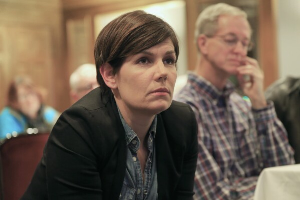 FILE - Jane Kleeb, founder of Bold Nebraska, participates in a meeting with other anti-Keystone XL pipeline activists, Jan. 15, 2015, in York, Neb. Kleeb, chair of the Nebraska Democratic Party and the founder of pipeline opposition group Bold Nebraska, and Gita Syahrani, who recently led the Sustainable District Association and convened the Earth-Based Economy Coalition to accelerate sustainable development in Indonesia, have been named the recipients of the 2023 Climate Breakthrough Award, which offers the world’s largest climate grant for individuals. (AP Photo/Nati Harnik, File)