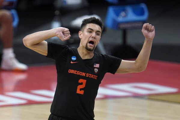 Oregon State guard Jarod Lucas (2) celebrates a basket against Tennessee during the second half of a men's college basketball game in the first round of the NCAA tournament at Bankers Life Fieldhouse in Indianapolis, Friday, March 19, 2021. Oregon State won 70-56. (AP Photo/Paul Sancya)