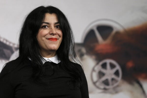 FILE - Director, illustrator and author Marjane Satrapi poses for photographers as she arrives to present the movie 