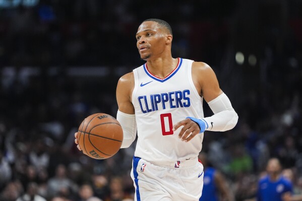 FILE - Los Angeles Clippers guard Russell Westbrook moves up the court during the second half of an NBA basketball game against the Cleveland Cavaliers, April 7, 2024, in Los Angeles. (ĢӰԺ Photo/Ryan Sun, File)