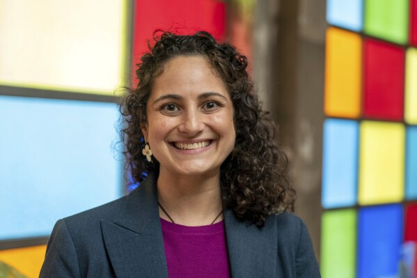 Samantha Woll, president of the board at the Isaac Agree Downtown Synagogue poses for a photo in Detroit, Oct. 13, 2022. Samantha Woll, a Detroit synagogue president was found stabbed to death outside her home Saturday, Oct. 21, 2023 police said. The motive wasn't known. (David Guralnick/Detroit News via AP)