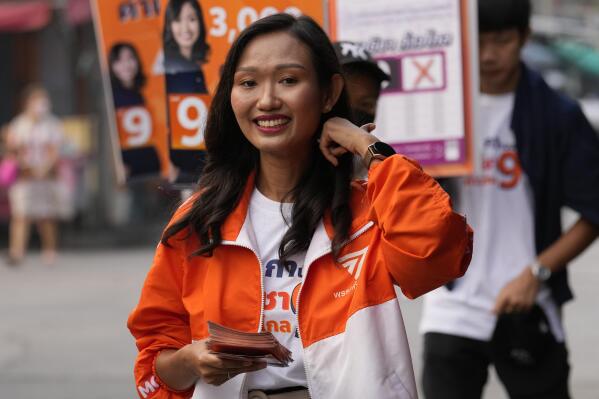 Prospective lawmaker for Move Forward Party Chonthicha Jangrew introduces herself during an election campaign in Pathum Thani province, north of Bangkok, Thailand, April 17, 2023. Three years ago, tens of thousands of mostly young people in Thailand took to the streets in heated demonstrations seeking democratic reforms. Now, with a general election coming in three weeks, leaders of the country’s progressive movement are hoping to channel the same radical spirit for change though the ballot box. (AP Photo/Sakchai Lalit)