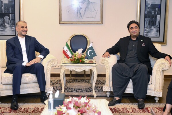 In this photo released by Pakistan's Ministry of Foreign Affairs, visiting Iranian Foreign Minister Hossein Amirabdollahian, left, meets with his Pakistani counterpart Bilawal Bhutto Zardari, in Islamabad, Pakistan, Thursday, Aug. 3, 2023. Amirabdollahian is in Islamabad for two-day visit to discuss with Pakistani top officials a range of issues, including the completion of the gas pipeline project, improving trade and economic ties between the two sides and ensuring security at a long border which the two nations share in the South Asian region. (Pakistan Ministry of Foreign Affairs via AP)