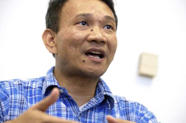 Vuthy Tha, a Cambodian reporter at Radio Free Asia who spent 7 years in a Thai refugee camp before arriving in the United States, participates in an interview, Tuesday, April 1, 2025, at the RFA office in Washington. (AP Photo/Rod Lamkey, Jr.)