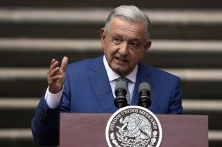 FILE - Mexican President Andres Manuel Lopez Obrador speaks at the National Palace in Mexico City, Jan. 10, 2023. Mexico’s president described the slayings of five men caught on security camera footage as an apparent “execution” by soldiers, and vowed Wednesday, June 7, 2023, that the perpetrators would face justice. (AP Photo/Fernando Llano, File)