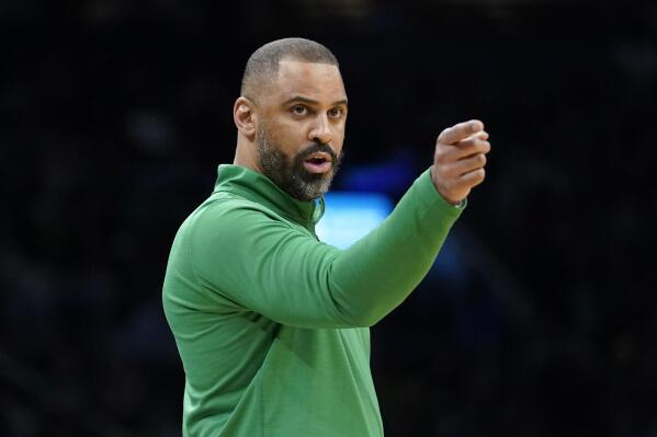 Boston Celtics head coach Ime Udoka shouts from the bench in the first half of an NBA basketball game against the Minnesota Timberwolves, Sunday, March 27, 2022, in Boston. The Celtics won 134-112. (AP Photo/Steven Senne)