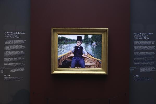 The painting "A Boating Party" by French painter Gustave Caillebotte is displayed at the Orsay Museum, Monday, Jan. 30, 2023 in Paris. France has acquired the stunning impressionist masterpiece for its national collection of art treasures, using a donation from French luxury goods giant LVMH to pay the 43-million euro ($47 million) price tag for Gustave Caillebotte's "A Boating Party." The work, remarkable in its realism, delicate coloring and almost cinematic perspective, as though the artist was in the boat with the rower, went on display in the Musée d'Orsay in Paris. (AP Photo/Aurelien Morissard)