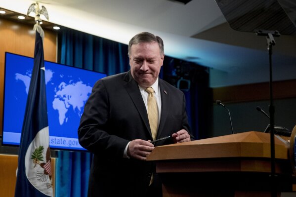 Secretary of State Mike Pompeo, leaves a news conference at the State Department in Washington, Monday, Nov. 18, 2019. Pompeo spoke about Iran, Iraq, Israeli settlements in the West Bank, protests in Hong Kong, and Bolivia, among other topics. (AP Photo/Andrew Harnik)