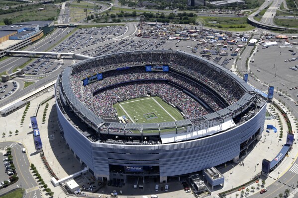 FILE - This is an aerial view showing MetLife Stadium in East Rutherford, N.J., June 20, 2014. The 2026 World Cup final will be at MetLife Stadium in East Rutherford, N.J., on July 19. FIFA made the announcement Sunday, Feb. 4, 2024, at a Miami television studio, allocating the opener of the 39-day tournament to Mexico City’s Estadio Azteca on June 11. (AP Photo/Seth Wenig, File)