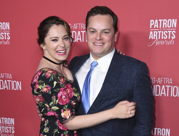 FILE - In this Nov. 8, 2018, file photo, Rachel Bloom, left, and Dan Gregor arrive at the Patron of the Artists Awards at the Wallis Annenberg Center for the Performing Arts in Beverly Hills, Calif. “Crazy Ex-Girlfriend” star Bloom has had her first child. The 32-year-old Bloom says on Instagram that she and her husband, Gregor, returned home Wednesday, April 1, 2020, with the healthy baby girl who had spent time in intensive care in a California hospital. (Photo by Jordan Strauss/Invision/AP, File)