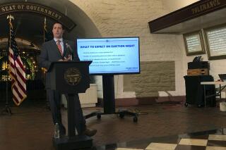 Ohio Secretary of State Frank LaRose briefs reporters on election preparations at the Ohio Statehouse in Columbus, Ohio, on Tuesday, Sept. 8, 2020. (AP Photo/Julie Carr Smyth)