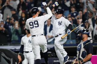 Judge 2 homers, throws out runner, Yanks beat Guardians 4-1