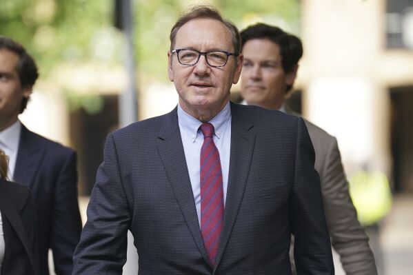 Actor Kevin Spacey arrives at Southwark Crown Court where he is accused of sexual offenses against four men while he worked at the Old Vic Theatre in London, Thursday July 6, 2023. (lucy North/PA via AP)