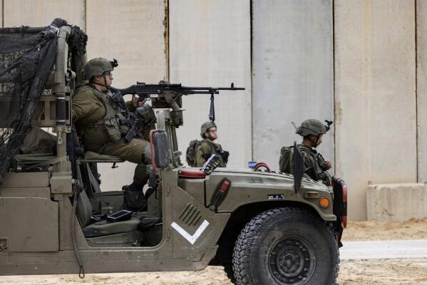 Israel announces completion of security barrier around Gaza | AP News