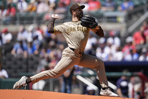 San Diego Padres pitcher Dylan Cease (84) works against the Atlanta Braves in the first inning of a baseball game, Monday, May 20, 2024, in Atlanta. (AP Photo/Mike Stewart)