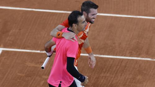 Croatia's Ivan Dodig, left, and Austin Krajicek of the U.S. celebrate winning the men's doubles final match of the French Open tennis tournament against Belgium's Joran Vliegen and Sander Gille in two sets, 6-3, 6-1, at the Roland Garros stadium in Paris, Saturday, June 10, 2023. (AP Photo/Jean-Francois Badias)