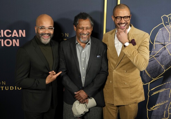 Cord Jefferson, right, writer/director/producer of "American Fiction," poses with cast member Jeffrey Wright, left, and Percival Everett, author of the book upon which the movie is based, at a screening of the film, Tuesday, Dec. 5, 2023, at the Academy of Motion Picture Arts and Sciences in Beverly Hills, Calif. (AP Photo/Chris Pizzello)