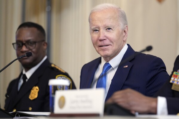 President Joe Biden meets with law enforcement officials in the State Dining Room of the White House in Washington, Wednesday, Feb. 28, 2024. (AP Photo/Andrew Harnik)