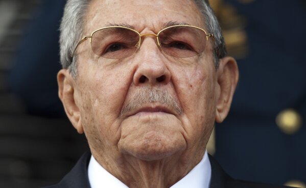
              FILE - In this March 17, 2015 file photo, Cuba's President Raul Castro listens to the playing of national anthems during his welcome ceremony at the Miraflores presidential palace in Caracas, Venezuela. On April 19, 2018 Raul Castro will step down as president after a decade in office. The world should expect no immediate radical change from a single-party system dedicated to stability above all else. Raul Castro will remain first secretary of the Communist Party, described by the Cuban constitution as the country’s “highest guiding force.” (AP Photo/Ariana Cubillos, File)
            