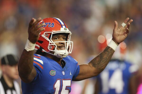 Florida quarterback Anthony Richardson (15) celebrates after a touchdown against South Carolina during the second half of an NCAA college football game, Saturday, Nov. 12, 2022, in Gainesville, Fla. (AP Photo/Matt Stamey)