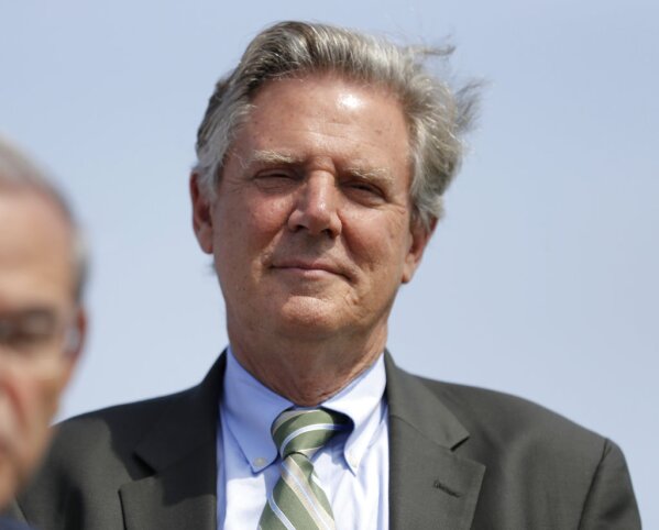 FILE - In this Aug. 17, 2017, file photo Rep. Frank Pallone, D-N.J., listens as Sen. Bob Menendez, left, speaks about flood insurance in Union Beach, N.J. (AP Photo/Julio Cortez, File)