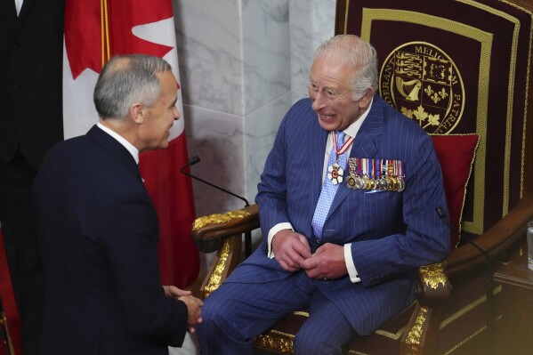 The Canadian Prime Minister Mark Carney, left, and King Charles talk on Tuesday, May 27, 2025, in the Senate in Ottawa, Canada, talking about the throne of the throne (Sean Kilpatrick/The Canadian Press about AP)