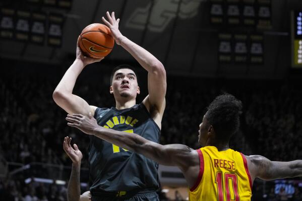 Purdue center Zach Edey (15) shoots over Maryland forward Julian Reese (10) during the second half of an NCAA college basketball game in West Lafayette, Ind., Sunday, Jan. 22, 2023. Purdue defeated Maryland 58-55. (AP Photo/Michael Conroy)