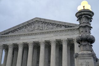 
              In this Jan. 7, 2019 photo, The Supreme Court is seen in Washington,. The Supreme Court is allowing the Trump administration to go ahead with its plan to restrict military service by transgender men and women while court challenges continue. The high court on Tuesday reversed lower-court orders preventing the Pentagon from implementing its plans. The high court for now declined to take up cases about the plan. The cases will continue to move through lower courts.  (AP Photo/J. Scott Applewhite)
            