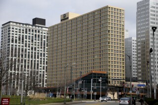FILE - The Wyndham Grand hotel is seen in Pittsburgh on March 20, 2017. Choice Hotels International is asking shareholders of rival chain Wyndham Hotels & Resorts to sign off on a buyout worth nearly $8 billion after Wyndham broke off negotiations, the company said Tuesday, Oct. 17, 2023. (AP Photo/Keith Srakocic, File)