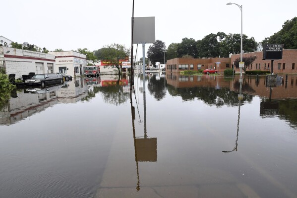 Businesses on County Street in Attleboro, Mass. remain closed due to flooding from heavy rain Tuesday, Sept. 12, 2023. (Mark Stockwell/The Sun Chronicle via AP)