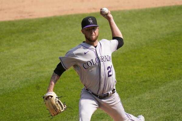 Colorado Rockies starting pitcher Kyle Freeland delivers during the second inning of a baseball game against the Chicago White Sox Wednesday, Sept. 14, 2022, in Chicago. (AP Photo/Charles Rex Arbogast)