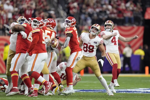 San Francisco 49ers kicker Jake Moody (4) watches his field goal split the uprights during the first half of the NFL Super Bowl 58 football game against the Kansas City Chiefs on Sunday, Feb. 11, 2024, in Las Vegas. (AP Photo/Eric Gay)