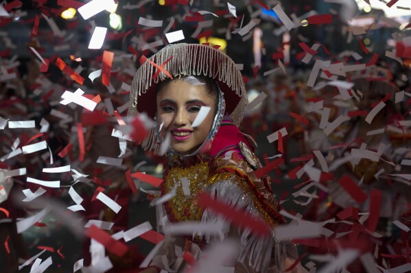 A "Kullagua'' dancer performs in the annual parade honoring the "Lord of Great Power" in La Paz, Bolivia, May 25, 2024, Bolivians celebrate one of the country's biggest and most extravagant religious festivals, which pays tribute to Jesus Christ in a fusion of Indigenous beliefs and Catholicism. (AP Photo/Juan Karita)