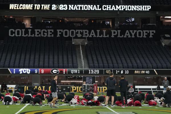 Georgia players work out during practice inside SoFi Stadium ahead of the national championship NCAA College Football Playoff game between Georgia and TCU, Saturday, Jan. 7, 2023, in Inglewood, Calif. The championship football game will be played Monday. (AP Photo/Marcio Jose Sanchez)