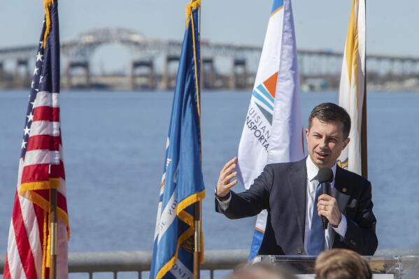 United States Secretary of Transportation Pete Buttigieg speaks during a press conference on the seawall at the Civic Center in Lake Charles, La., Thursday, Feb. 9, 2023. (Rick Hickman/American Press via AP)