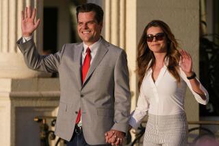 FILE - U.S. Rep. Matt Gaetz, R-Fla., and his girlfriend Ginger Luckey enter "Women for American First" event, Friday, April 9, 2021, in Doral, Fla. Gaetz eloped to Southern California marrying Ginger Luckey in a small ceremony on Catalina Island. The 39-year-old Republican announced the Saturday, Aug. 21, 2021 wedding on his personal Twitter page. He exclaimed “I love my wife!” along with a photo of them together. (AP Photo/Marta Lavandier, file)