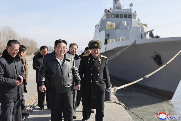 This undated photo provided on Feb. 2, 2024, by the North Korean government, North Korean leader Kim Jong Un, center, visits a shipyard in Nampho, North Korea. Independent journalists were not given access to cover the event depicted in this image distributed by the North Korean government. The content of this image is as provided and cannot be independently verified. Korean language watermark on image as provided by source reads: 