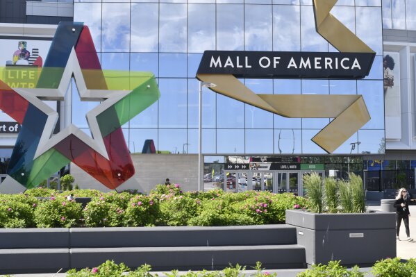FILE - A visitor leaves the Mall of America, Thursday, June 11, 2020, in Bloomington, Minn. A Minneapolis teenager was sentenced Thursday, May 30, 2024, to more than 30 years for a fatal shooting that shut down the Mall of America during the holiday shopping rush in 2022. (AP Photo/Jim Mone, File)